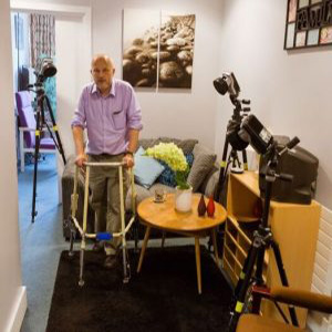 man being recorded for experiment with walking frame