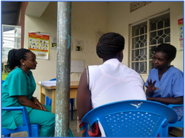 women in Uganda talking about cervical screenings