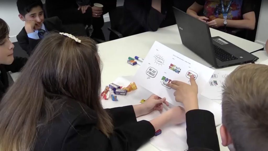 Not just a thought students designing logos