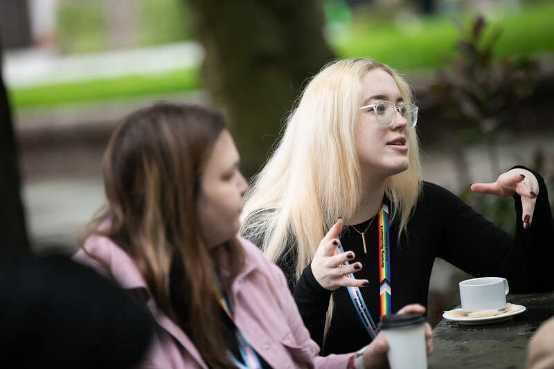 someone talking in a discussion group