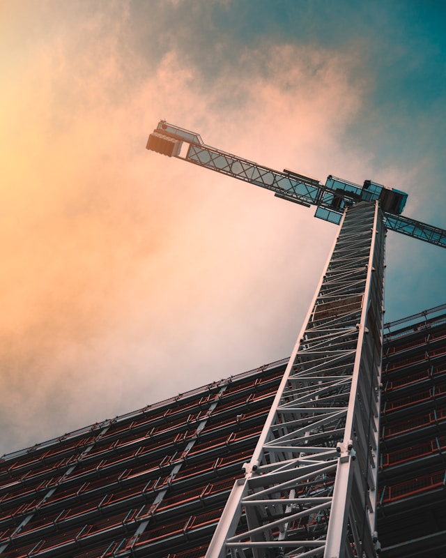 Cranes at the side of a building in development