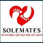 A red cartoon heart with two white footprints on it. Below the heart, some black and red text says ‘Sole Mates: The Microbes That Keep Your Feet Happy’