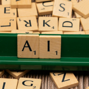 Scrabble tiles showing 'AI'