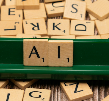 Scrabble tiles showing 'AI'