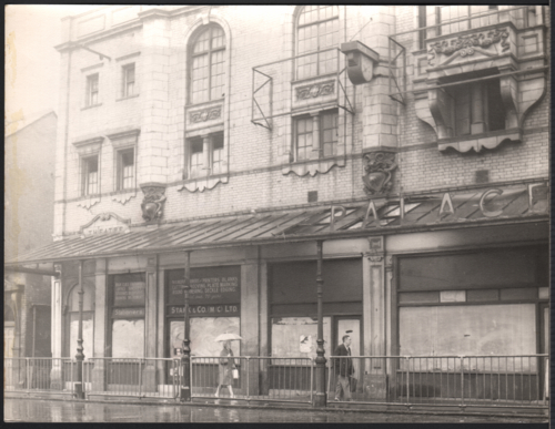 A close up of the front of the Palace Theatre Building