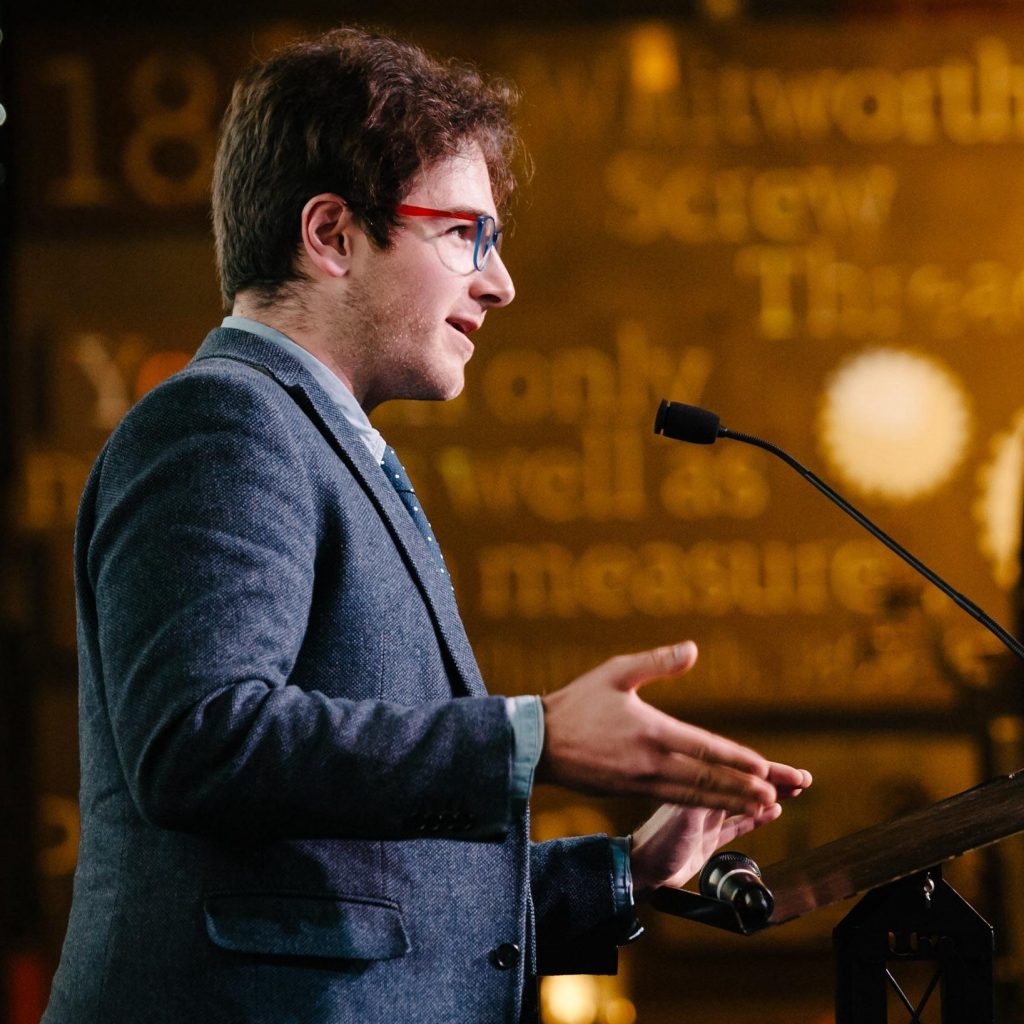 Image of Marc green talking at a podium